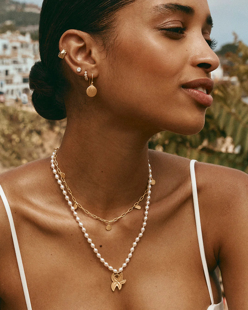 Golden beachcomber charm necklace