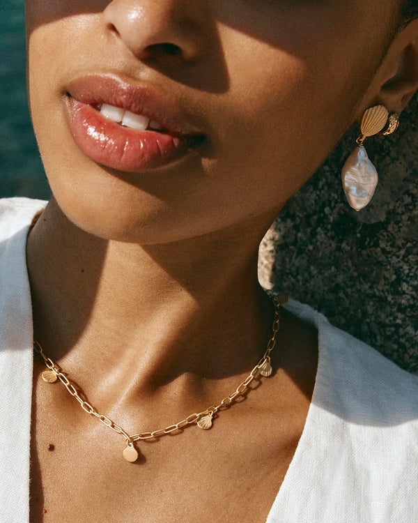 Golden beachcomber charm necklace